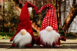 red and white santa claus figurine