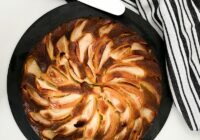 brown and white pastry on black plate